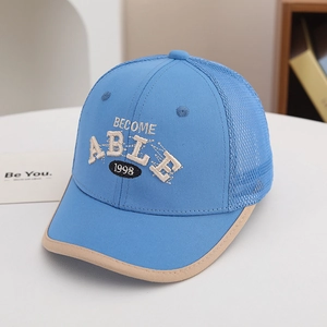 Close-up of sky blue mesh baseball cap with embroidered lettering and breathable net