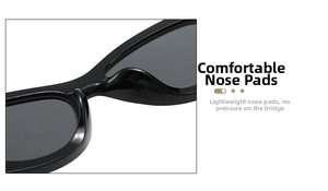 Detail of comfortable integrated nose pads on glossy black thick frame cat eye sunglasses