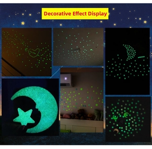 Luminous wall stickers featuring stars and moon shapes glowing in the dark for ceiling decor