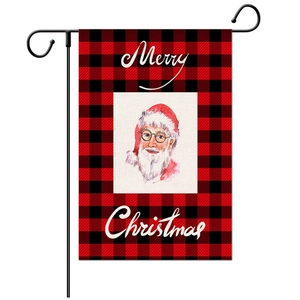 Merry Christmas garden flag detail featuring a watercolor Santa on red buffalo plaid linen