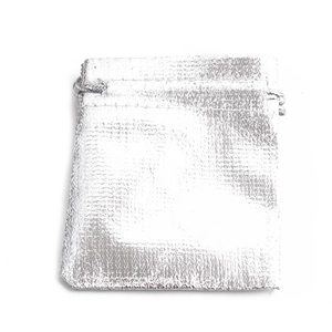 Shiny metallic silver drawstring pouch for jewelry and gifts on white background