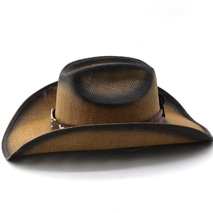 Detail of gradient woven straw cowboy hat with leather band and metallic studs