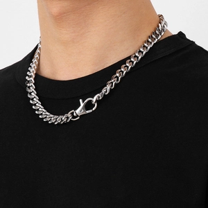 Silver Miami Cuban link chain necklace with large lobster clasp worn by a male model