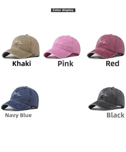 Detailed color options of washed cotton puppy baseball caps in khaki, pink, and navy