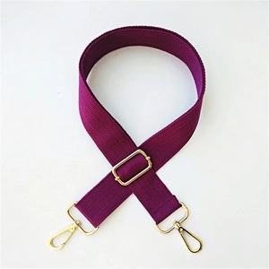 Close-up of adjustable purple canvas strap with durable gold metal swivel hooks