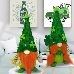 Detail of St. Patrick's Day gnomes with green felt hats and lucky clover accessories