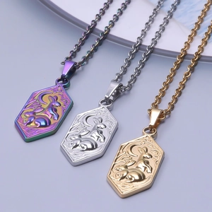 Detail showing gold, silver, and colorful rabbit moon relief pendants on O-chains
