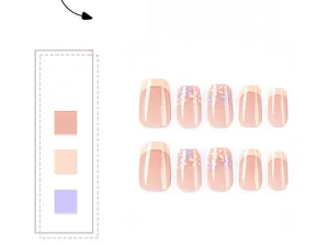 Close-up of short French press-on nails with yellow tip and purple floral accents