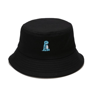 Black cotton bucket hat with blue dinosaur embroidery on plain white background