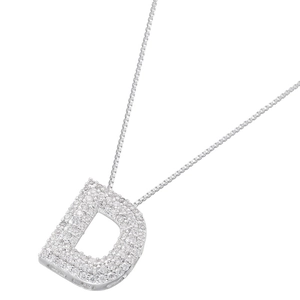 Macro shot of silver plated D pendant necklace with white cubic zirconia stones