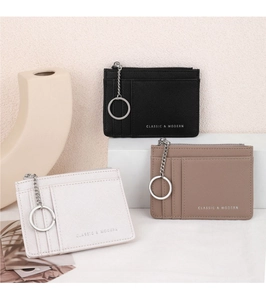 Crosshatch leather card holder with three card slots, zip pocket and metal keychain