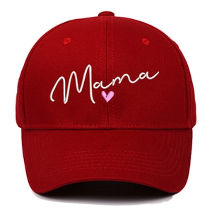 Close-up of white Mama embroidery and pink heart on a dark red cotton baseball cap