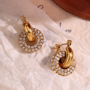 Close-up of 18K gold plated donut hoop earrings with micro-inlaid sparkling rhinestones