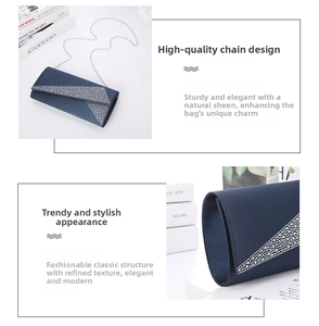 Detail of navy blue satin evening clutch with sparkling silver rhinestones and chain strap