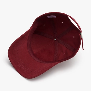 Deep red cotton baseball cap interior view showing high-quality stitching and metal buckle
