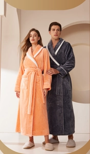 Detailed texture of thick waffle pattern flannel fabric on a long couple bathrobe