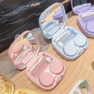 Compact contact lens travel kit in macaron colors including mirror, case and tweezers