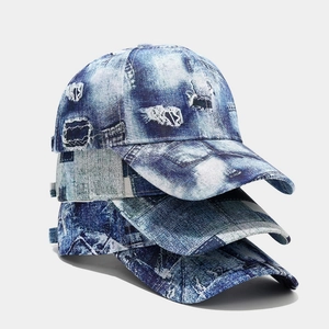 Vintage denim baseball cap with distressed torn holes and bleached tie-dye patterns