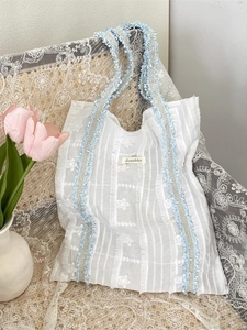 Sac fourre-tout en toile texturée à fleurs avec bordures bleues et grande capacité
