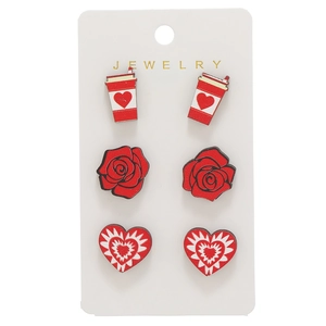 Wooden Valentine earring set with red rose and heart patterns on a jewelry card