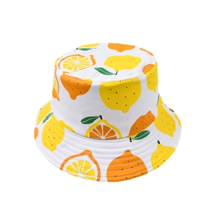 Close-up of kids bucket hat with lemon and orange print and reinforced stitching