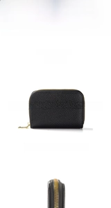 Detail of black pebbled leather RFID card holder with 11 accordion slots and gold zipper