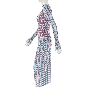 Detail of red and blue geometric diamond pattern on a slim fit long sleeve dress