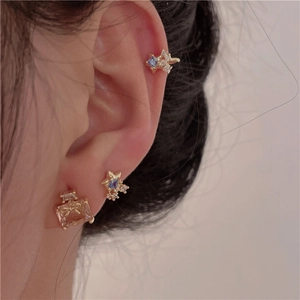 Star and perfume bottle clip-on earring set with blue zircon in gold finish