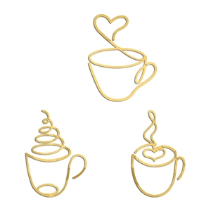 Detailed view of three minimalist golden acrylic coffee cup wall stickers on a plain white background