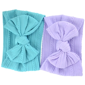 Detailed cable knit pattern on blue and purple nylon baby headbands with large bows