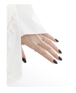 Close-up of double-layer S925 sterling silver minimalist wavy rings on hand