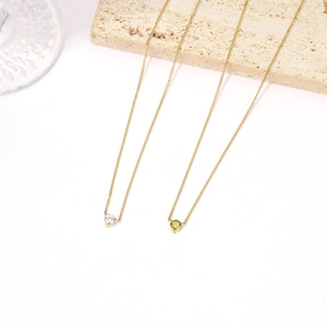 Minimalist gold necklaces with sparkling zircon and olive green gemstone pendants