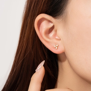 Elegant gold S925 sterling silver stud earrings with three round cubic zirconia stones