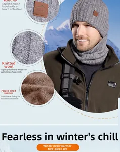 Detailed view of grey knit beanie and snood with soft thermal fleece lining and logo