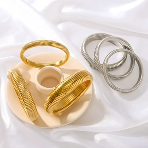 Bracciale rigido elastico stile vintage placcato oro 18K e argento su supporto in ceramica