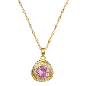 Luxurious gold titanium necklace featuring a rotating pink zircon pendant with diamond accents