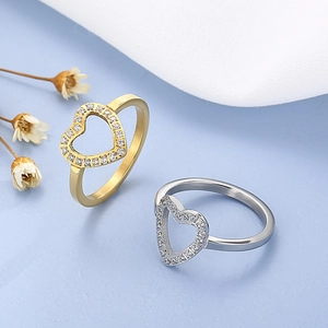 Hollow heart-shaped rings in gold and silver finish with sparkling zircon stones
