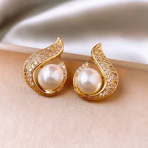 Mermaid pearl stud earrings with zircon fishtail design in 14k gold plating