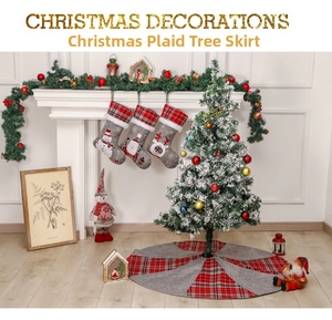Detail of Christmas tree skirt with eight-piece grey linen and red plaid fabric panels