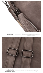 Detail of adjustable shoulder straps and metal tassel charm on brown matte backpack
