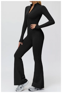 Macro shot of long sleeve black yoga bodysuit with front metal zipper and flared leg cut