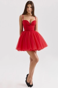 Detail of red mesh princess mini dress with layered tulle and fitted pleated bodice