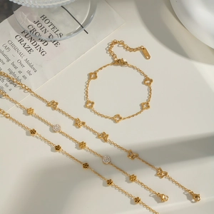 Chic 18K gold titanium steel bracelets with butterfly, flower, and zircon charms