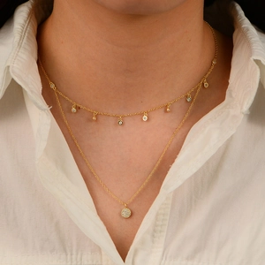 Double-layer 925 sterling silver necklace with cubic zirconia pendants on model