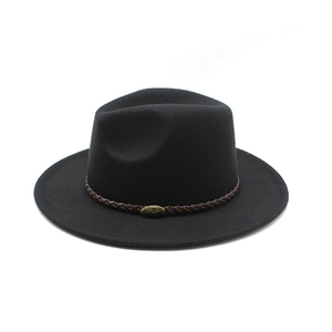 Detail of wool fedora with a woven leather band and antique gold metal buckle ornament