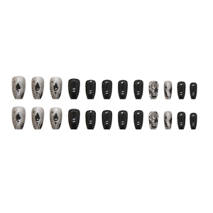 Sparkling black and silver press-on nails with glitter ombre and 3D geometric accents