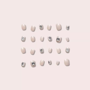 Short square press-on nails in nude pink with luxury rectangle rhinestones, 24 piece set