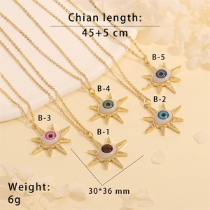 Detail showing five colors of star-shaped evil eye pendant necklaces with dimensions and weight