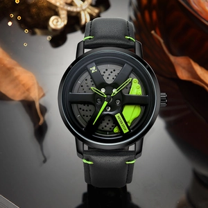 Black car wheel hub watch with green brake caliper design and stitched leather strap
