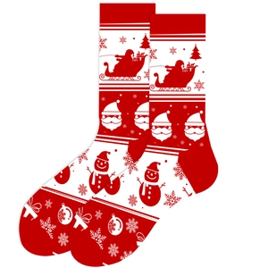 Close-up of festive red and white Christmas socks with Santa and snowman patterns
